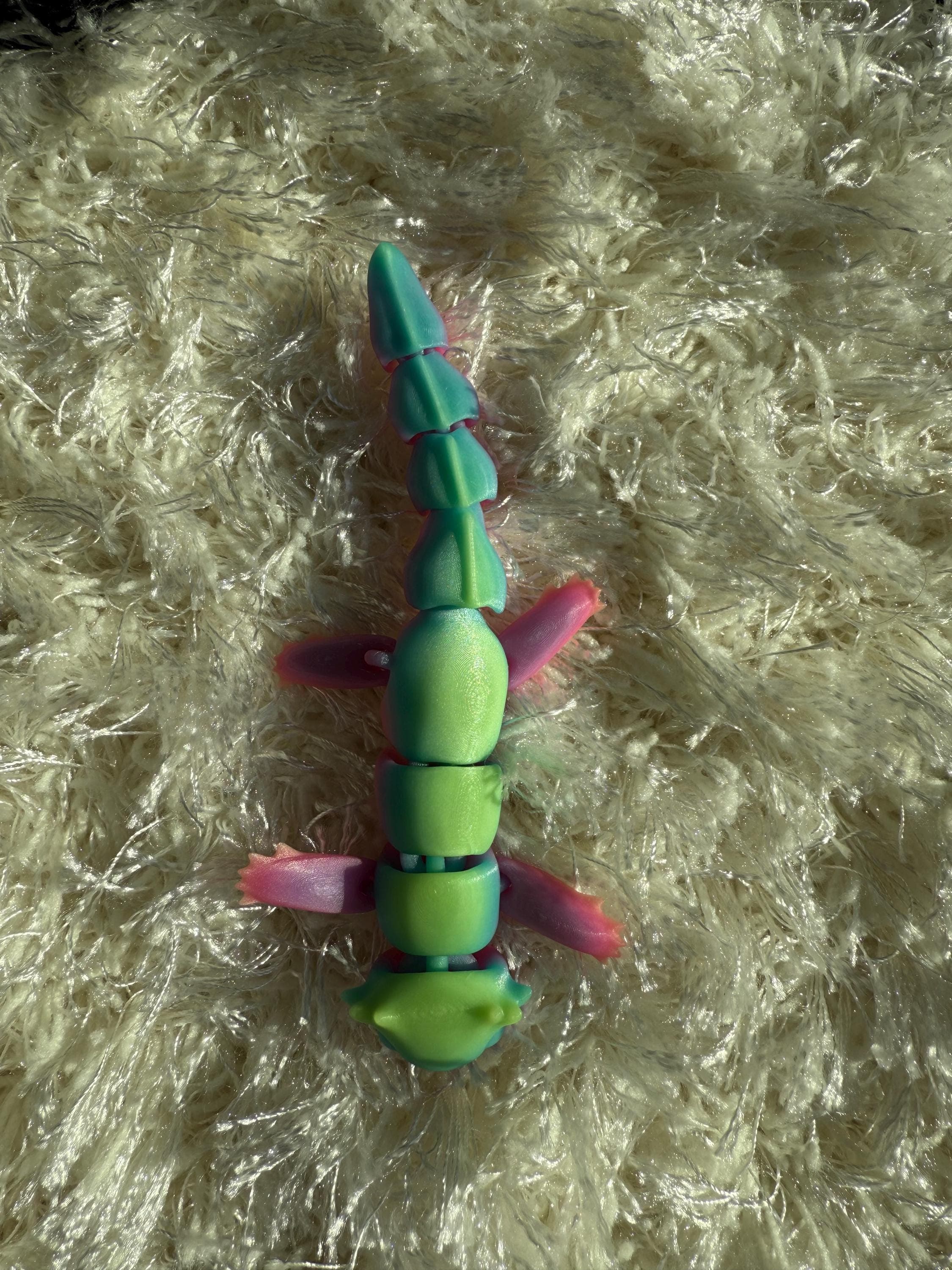 Glow-in-the-Dark Rainbow Axolotl Fidget Toy: Wiggly Desk Pet